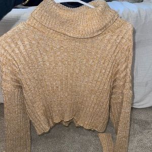 NEW WITH TAGS. Cropped turtle neck sweater.